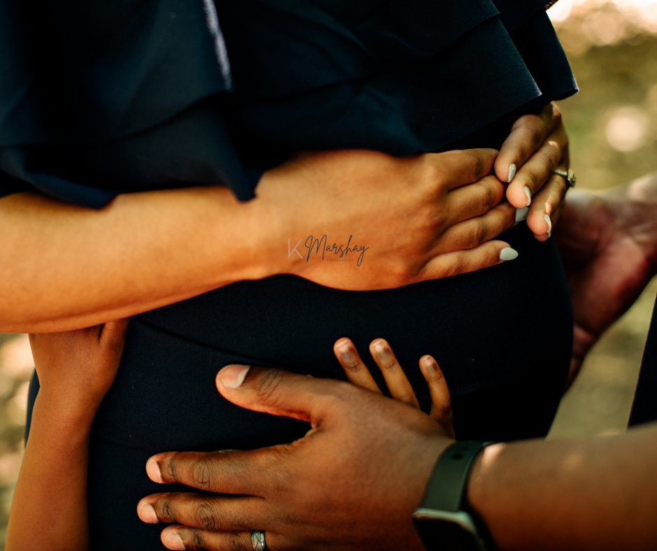 black family taking maternity photos in charlotte nc